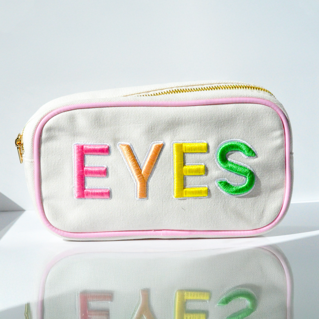 We Love Eyes canvas cosmetic bag in Vibes style with multicolour embroidered letters and pink piping